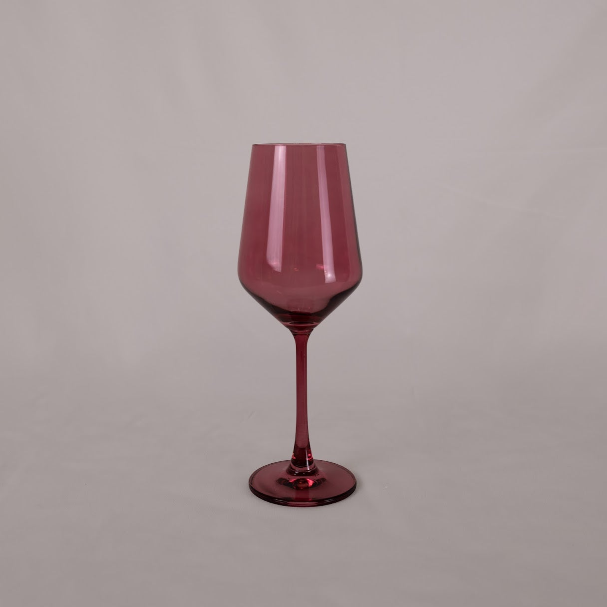 burgundy colored single wine glass