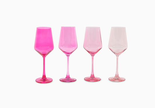 Four ombre pink colored drinking glasses